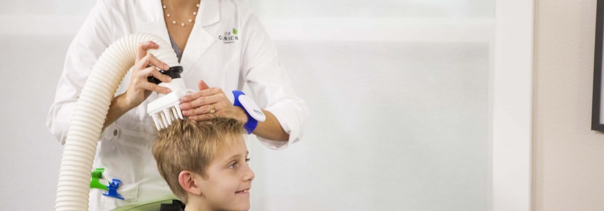 child receiving effective head lice treatment