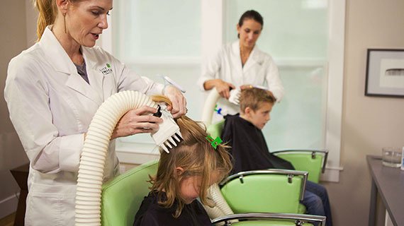 kids at head lice treatment center